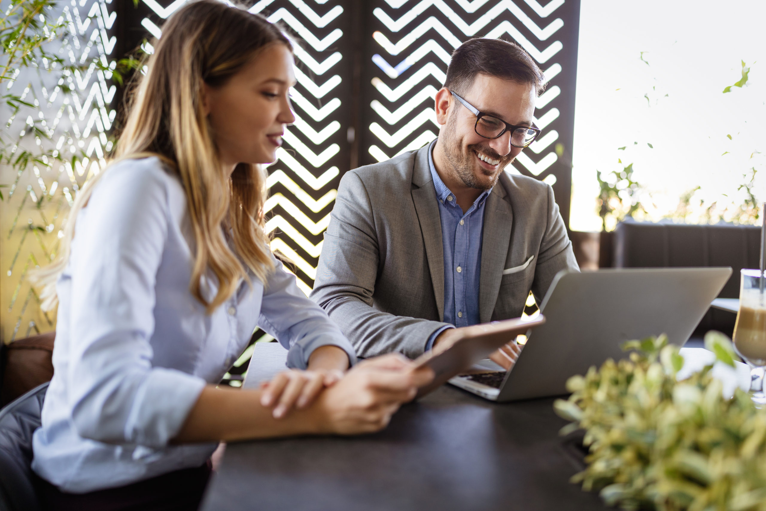 Woman consultant meeting with male client in a business casual setting